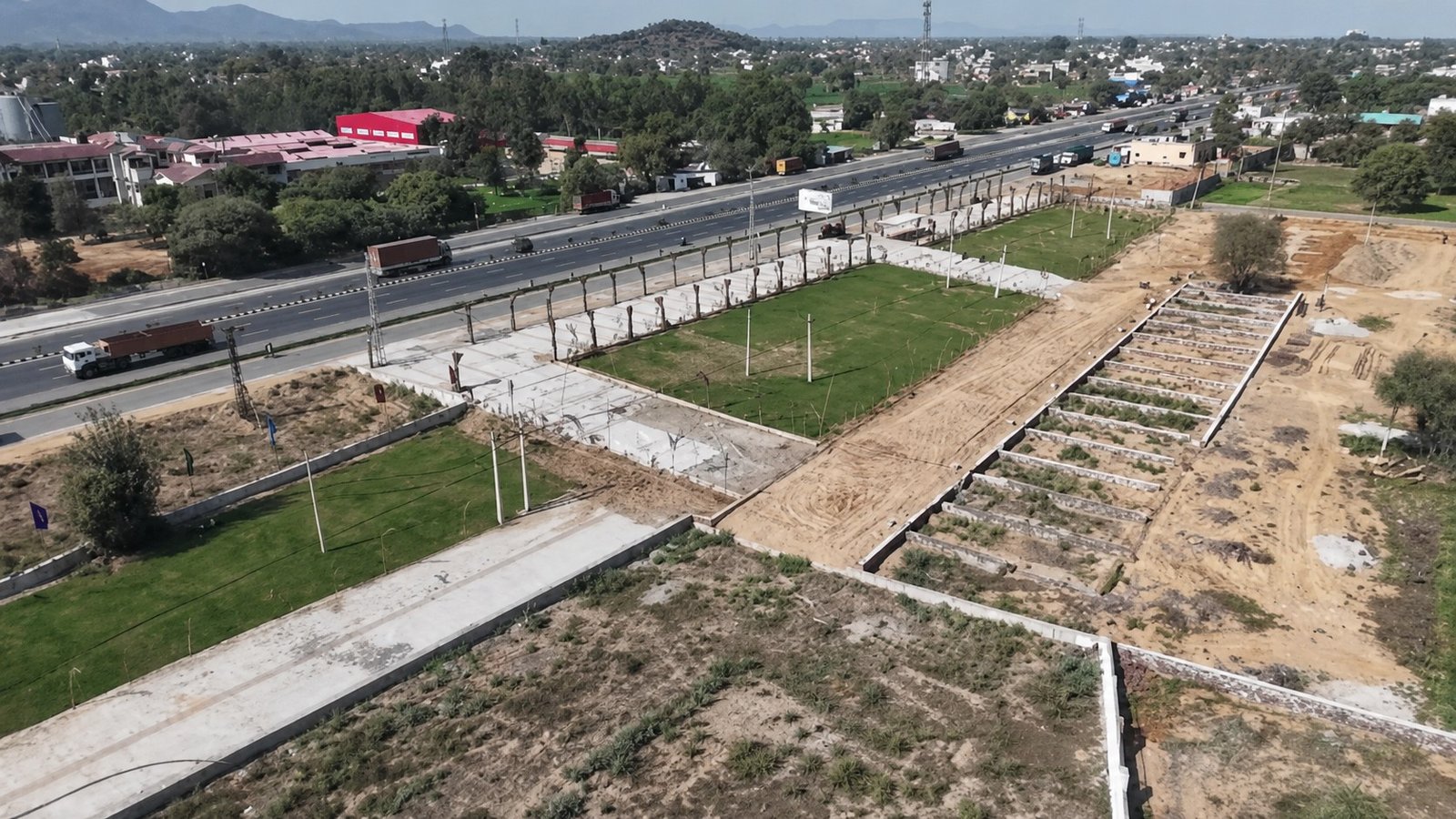 Actual aerial view showing the NH-48 corridor beside Mapple Green